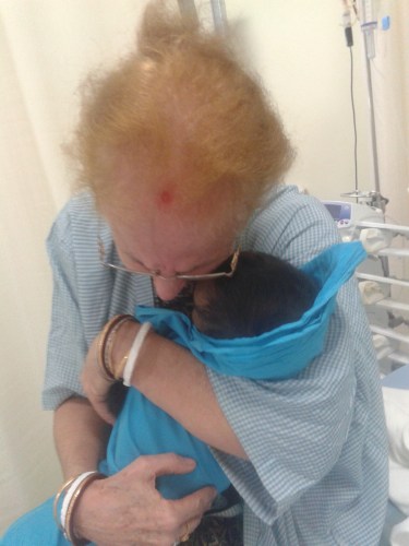 Holding Tuni after she died