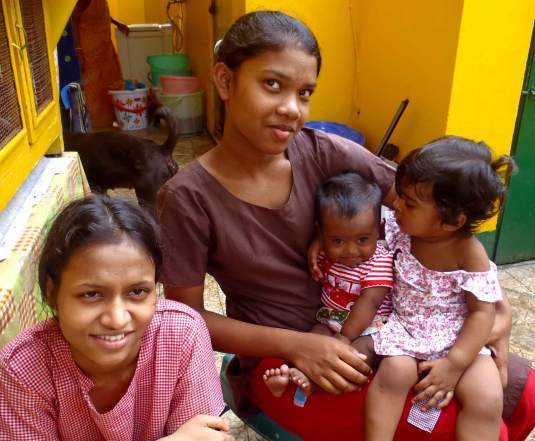 Tuni with her sisters, right at home at Shishur Sevay.