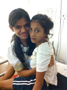 Ganga and her Didi in the Emergency Room. Ganga was alternatively angry, frightened, and thrashing about.