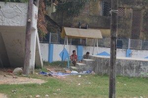 Our closest park, with two young men sitting on the "children's only" bench swing they didn't want us to use.